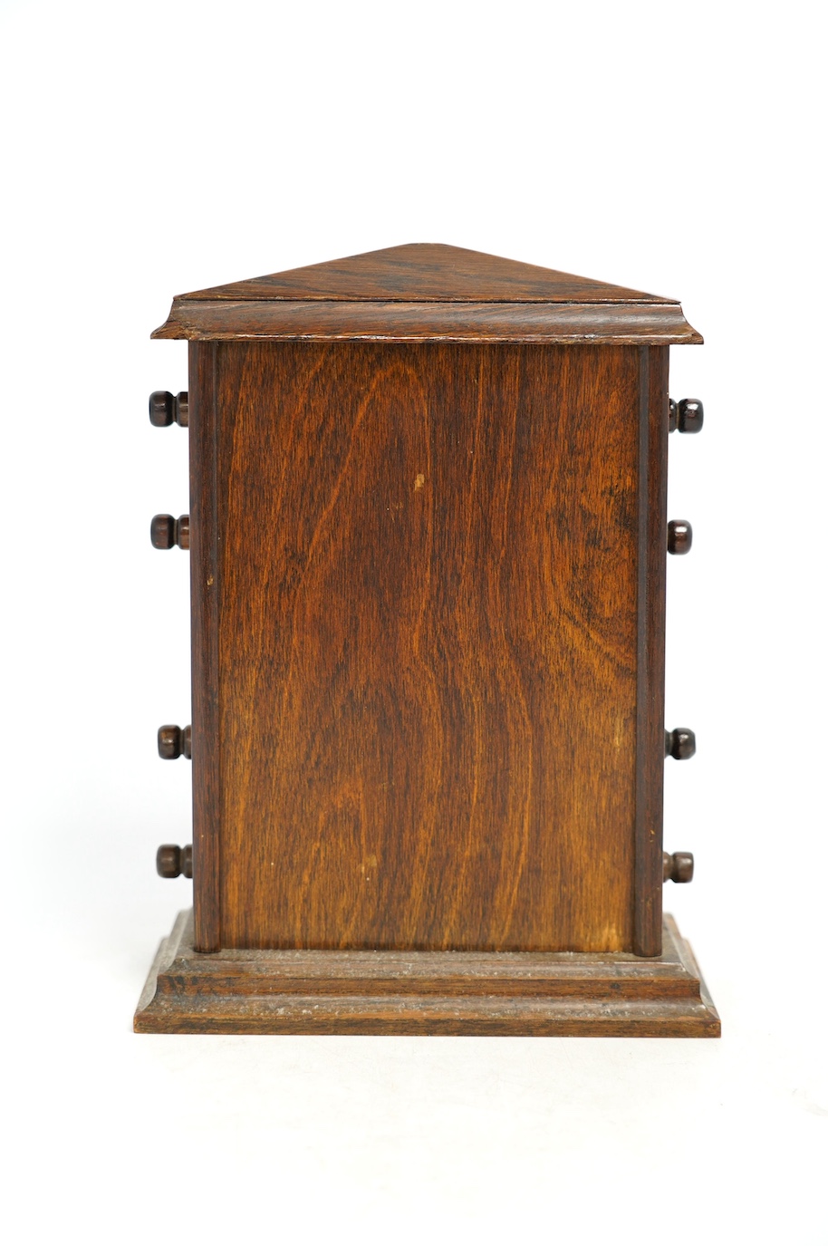 An early 20th century oak perpetual calendar, 19cm wide, 26cm high. Condition - fair